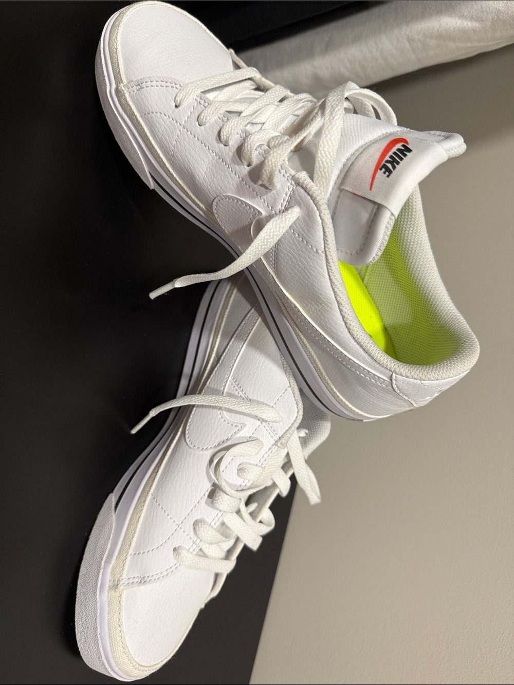 Nike White Low-Top Sneakers with Neon Yellow Insole and Red Logo